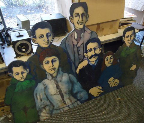 Italian Family Cutout: Painted plywood cutout of 19th century family. Measures 71"x48"