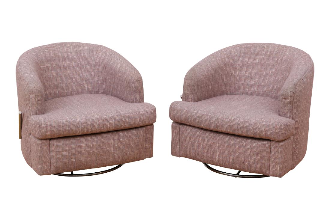 Pair Of Thayer Coggin Club Chairs: All original pair of early Thayer Coggin swivel/ tilt club chairs in very good condition. Tub form, upholstered in a mauve tweed fabric, and raised on a circular chrome base. With a recliner type exte