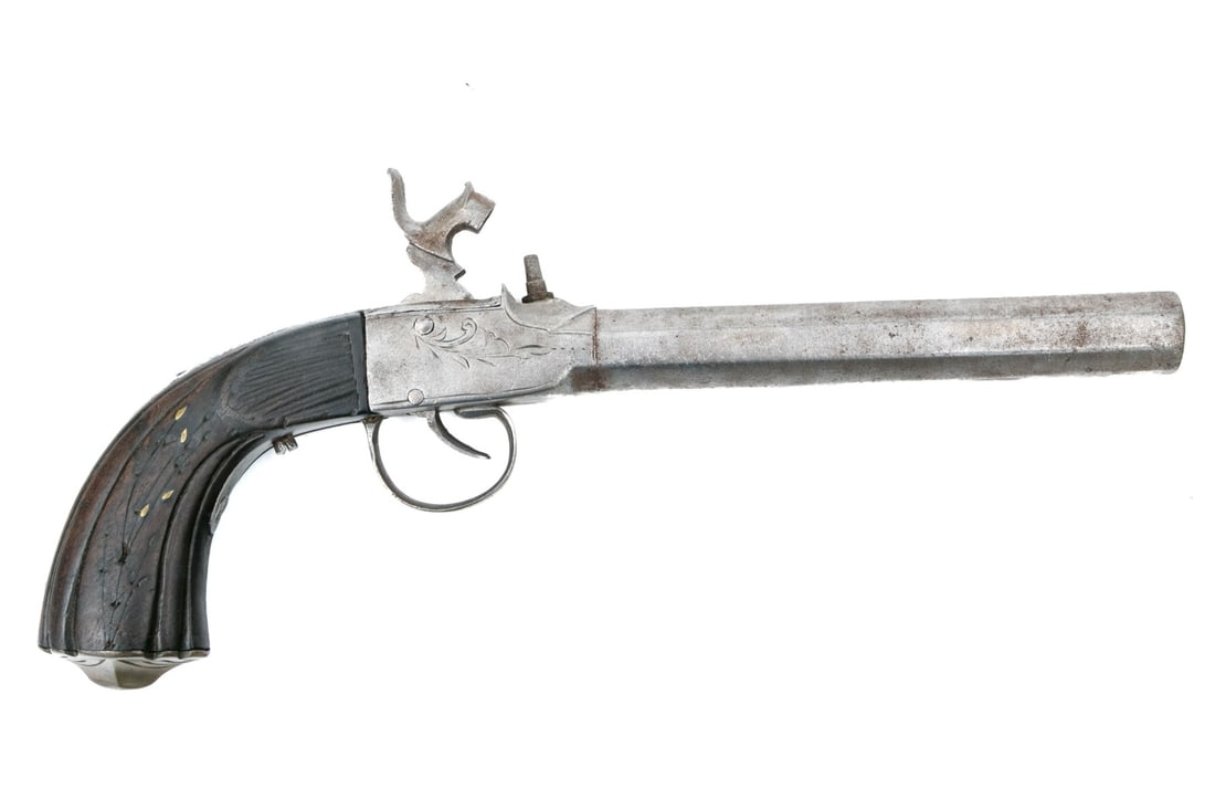 Mid 19th Century European Boxlock Percussion Pistol: A handsome mid 19th century European boxlock percussion pistol with chased foliate decoration and a carved grip with foliate inlay. Dimensions:12 1/4 L x 1 DAdditional hi-res images may be found on ou