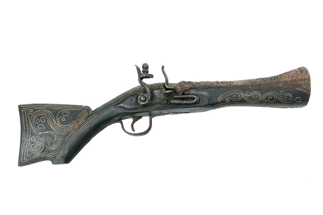 Ottoman Empire Camel Flintlock Pistol, Ca. 1800: A handsome Ottoman Empire camel flintlock pistol, ca. 1800. With decorative brass inlays and raised motifs.Dimensions:16 L x 3 3/4 DAdditional hi-res images may be found on our website (www dot blackr