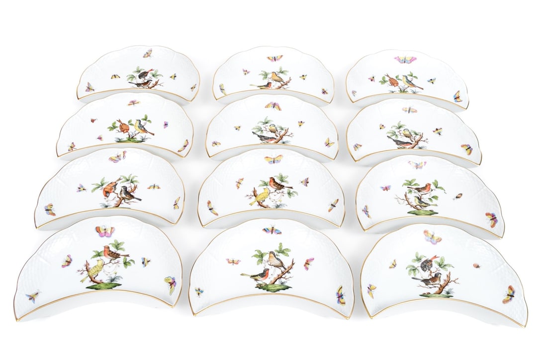 Set Of Twelve Herend Rothschild Bird Porcelain Crescent Salad Plates: A fabulous set of twelve Herend Rothschild Bird porcelain crescent form salad plates, each beautifully hand-painted and formed with textural trims with scalloped trims to the arched sides with birds o