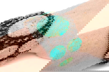 Sterling Silver Spectacular Ultra Wide Turquoise And Bead Framed Cuff Bracelet: Sterling silver spectacular ultra wide turquoise and bead framed cuff bracelet, old pawn style Marks: Sterling Dimensions: 2 3/8" interior diameter x 2 1/4" wide Weight: 86.8 gross dwt