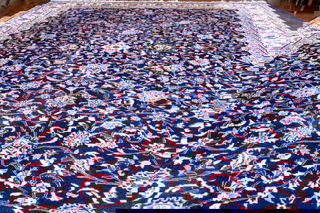 Hand-Knotted Wool Carpet, 13'-8 X 9'-10: A gorgeous hand-knotted wool room size carpet showcasing a cream main border with vining florals flanked by banded light blue and red guard borders around a vibrant royal blue field. The field is