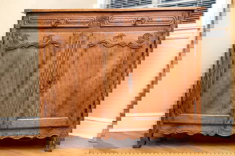 Antique Country French Cabinet: A delightful antique country French style cabinet in beautiful warm-toned medium brown wood. The console features a rectangular top with a wide banded edge overhanging two drawers with oval pulls flan