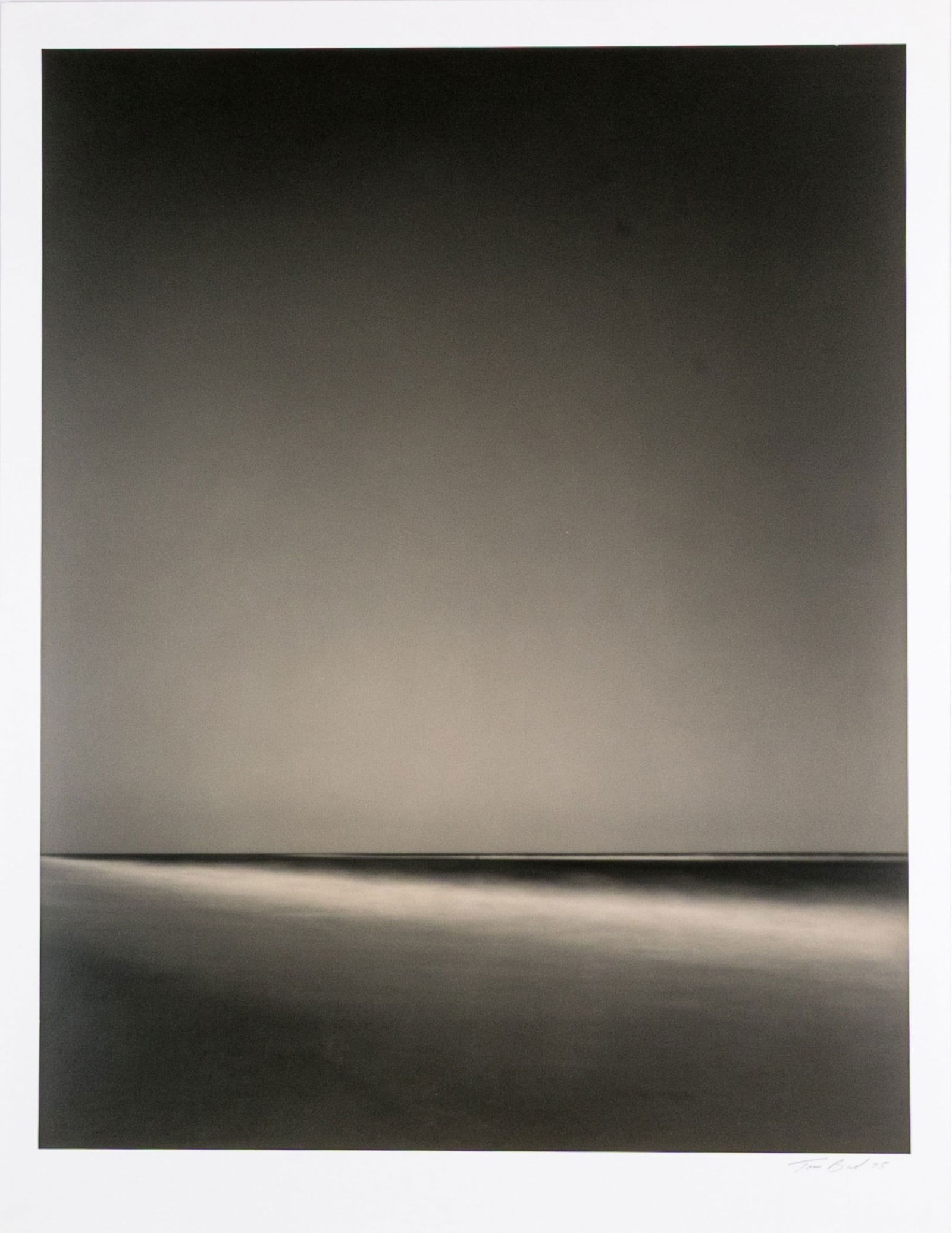 Tom Baril (American, B. 1952) "Jones Beach" Signed Gelatin Silver Print: Tom Baril (American, B. 1952) "Jones Beach" Gelatin silver print depicting a view of the ocean shore with a striking diagonal gradient created by the frothing waves contrasting a straight horizon. Sig