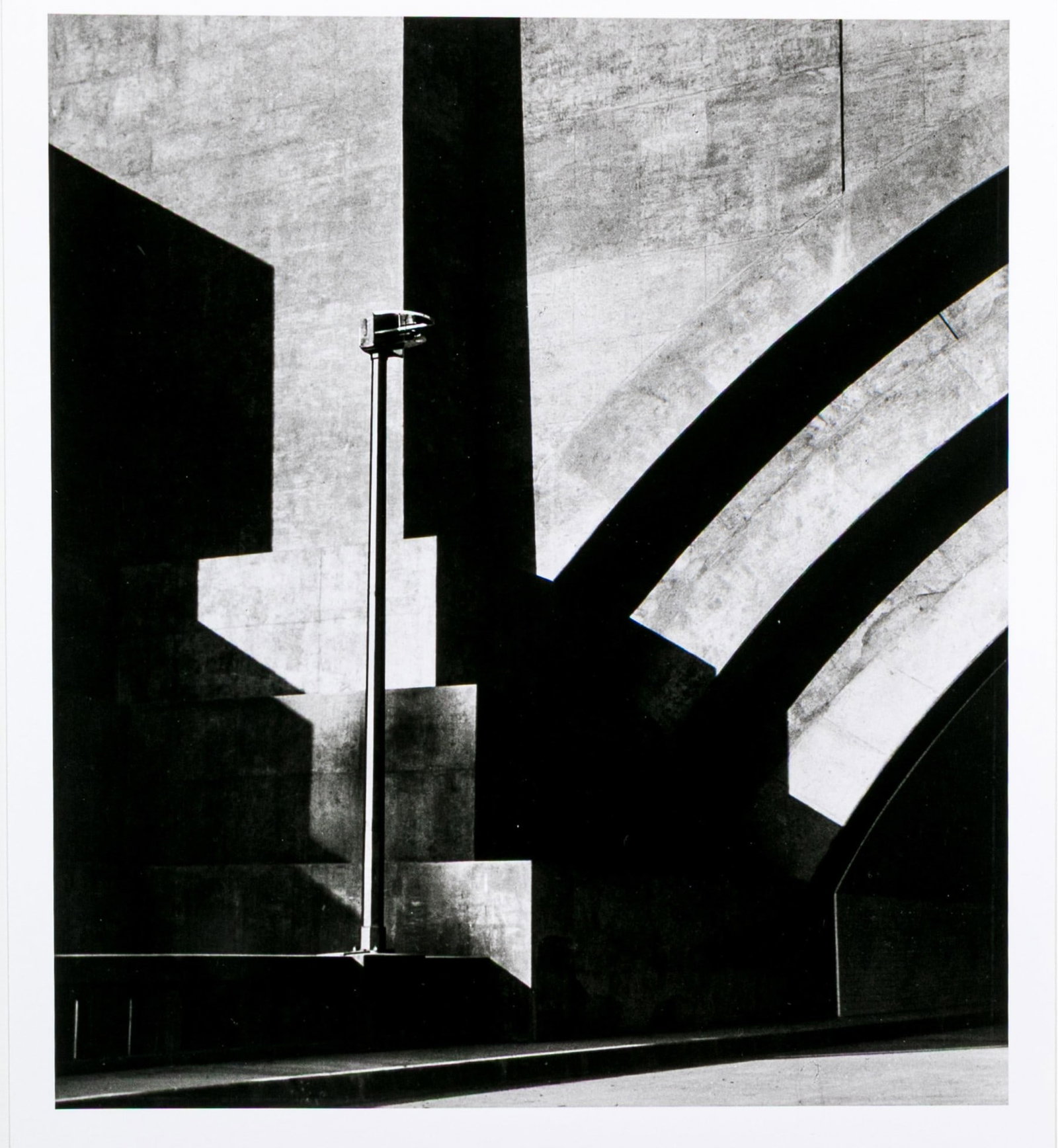 Horace Bristol (American, 1908-1997) "Tunnel Entrance With Lamp" Signed Gelatin Silver Print: Horace Bristol (American, 1908-1997) "Tunnel Entrance With Lamp" gelatin silver print depicting an urban landscape with striking contrast creating eye-catching patterns along arches and tiered column 