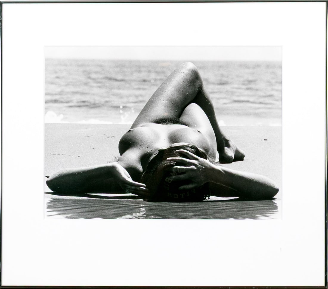 Lucien Clergue (French, 1934-2014) "Nude On The Beach, Camargue" Gelatin Silver Print: Lucien Clergue (French, 1934-2014) "Nude On The Beach, Camargue" Gelatin silver print depicting a perspective view of a female nude reclining on the beach with legs crossed leading to a view of the oc