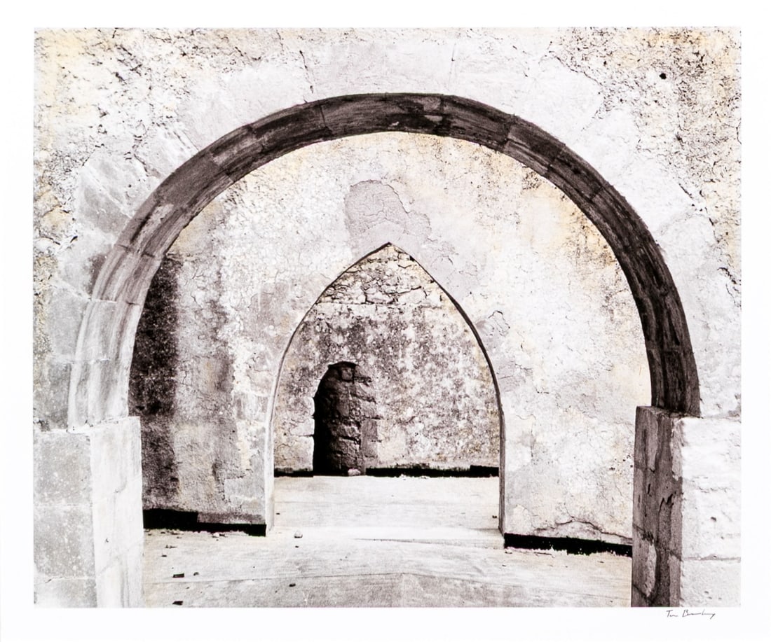 Tim Brumbeloe (American [IN], 20th C.) Signed Photographic Print, Stone Archways: Tim Brumbeloe (American [IN], 20th C.) photographic print depicting a view of stone architecture with various archways and intriguing textures in white, gray, and cream hues. Ink signed lower right. U