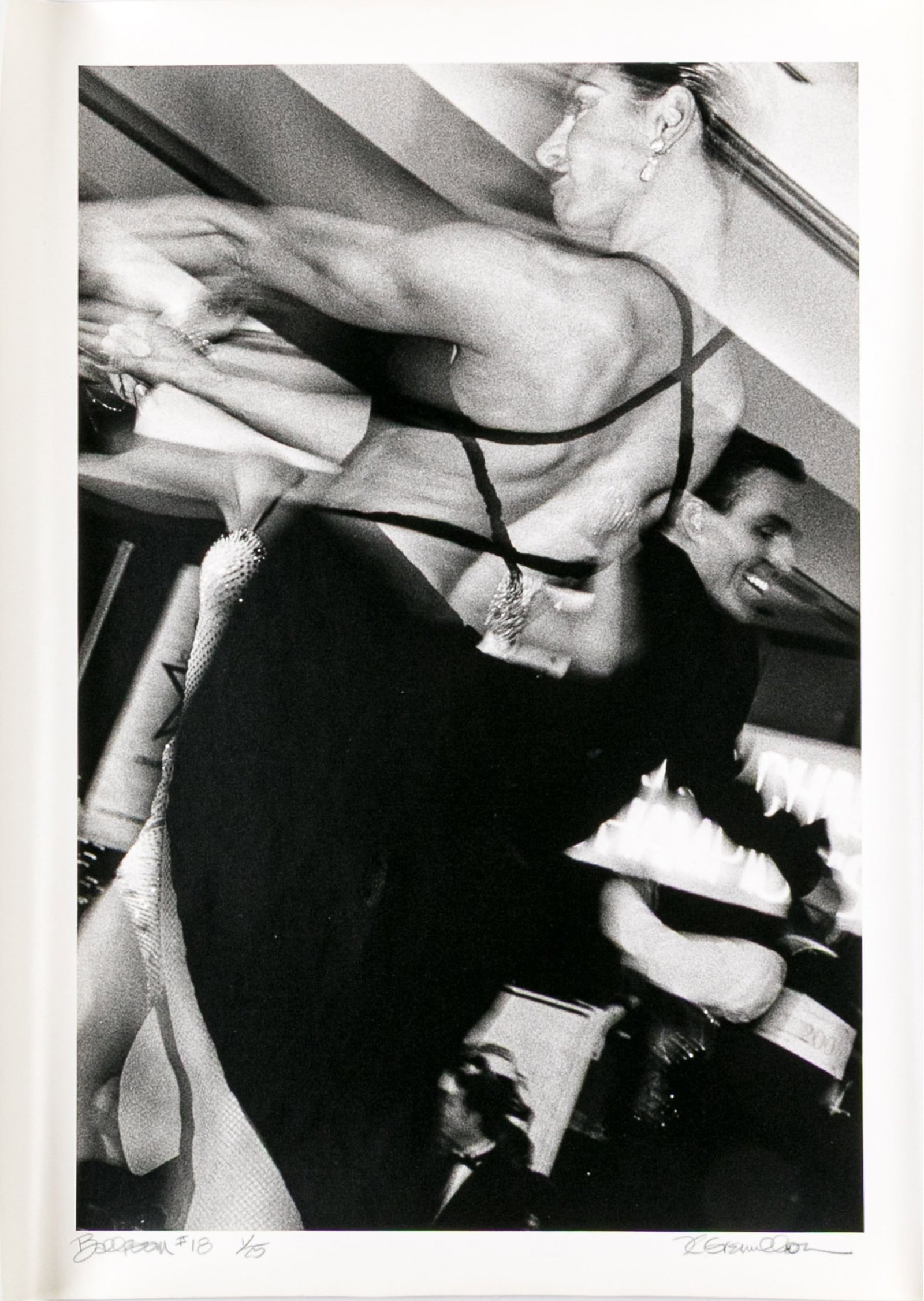 Kimberly Gremillion (America, B. 1955) "Ballroom #18" Signed Gelatin Silver Print: Kimberly Gremillion (America, B. 1955) "Ballroom #18" gelatin silver print depicting a woman in a black dress dancing in an interior with men in black suits. Blurred details add a great sense of motio