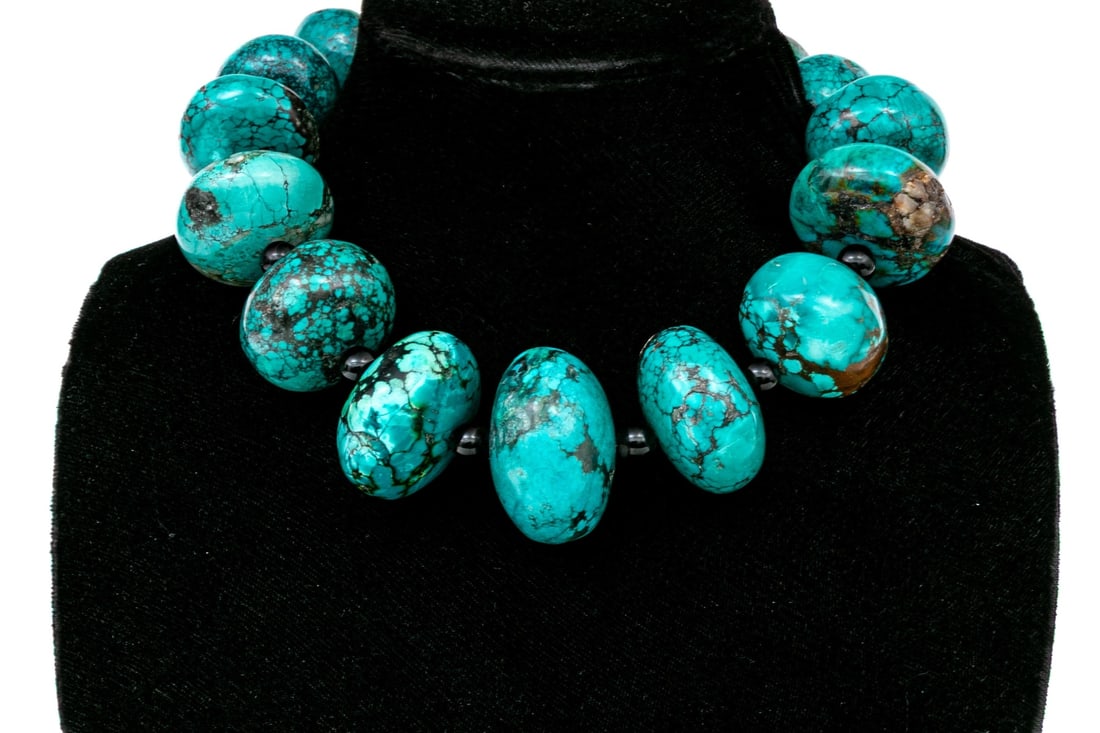 REMARKABLE GRADUATED SUPER CHUNKY ROUNDED TURQUOISE AND ONYX BEAD NECKLACE: This remarkable turquoise necklace features super chunky, rounded beads, graduated and punctuated with black onyx beads, finished with a toggle style clasp Marks: 925, LSF Dimensions: 17 1/2" long x 1