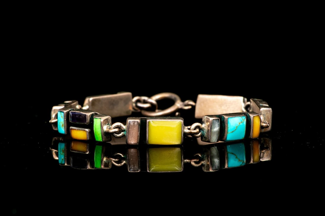 MEXICO STERLING SILVER VIBRANT TILE LINK BRACELET: This beautiful sterling silver bracelet from Mexico features vibrant, square and rectangular tiled links of assorted hardstones, finished with a toggle style clasp Marks: Mexico, 925 Dimensions: 7