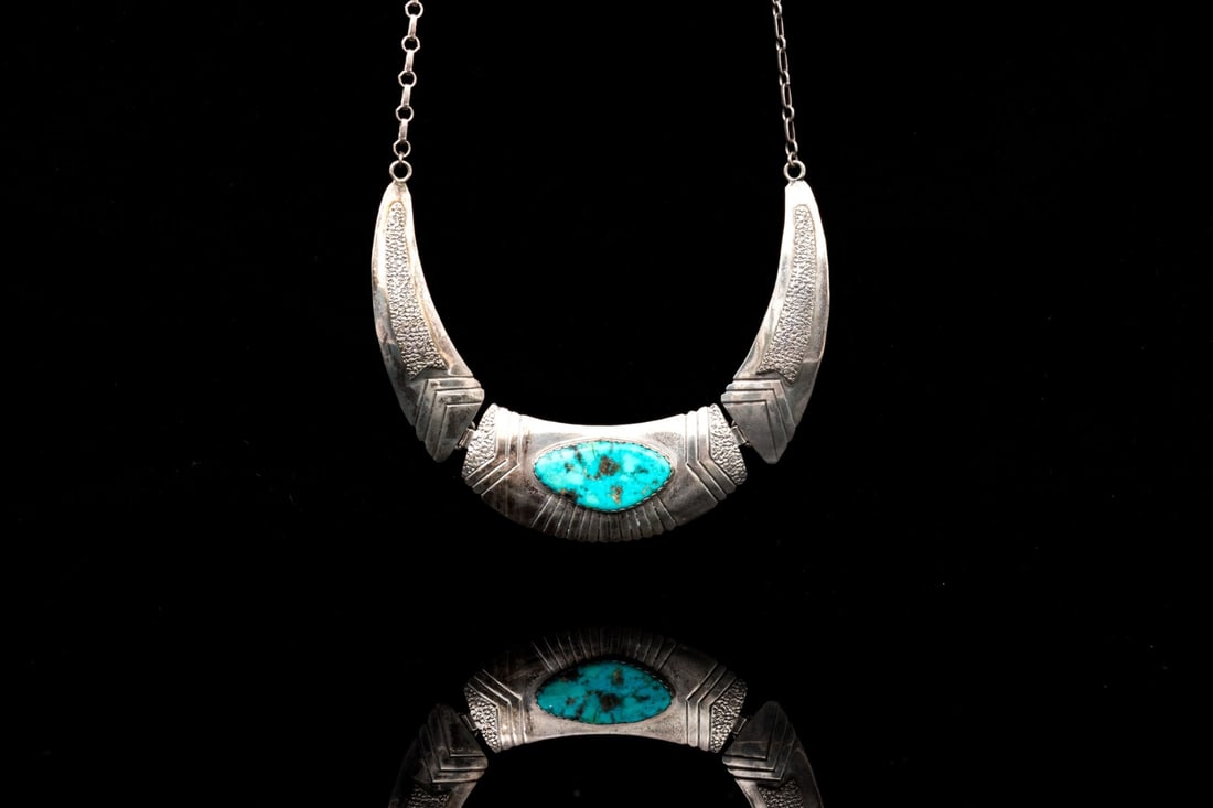 STERLING SILVER SOPHISTICATED THREE PART TURQUOISE SET COLLAR NECKLACE: This sophisticated, adjustable necklace has a three part, sterling silver body, slightly textured and finished with a free form turquoise center. The necklace is finished with hook style clasp Marks: 