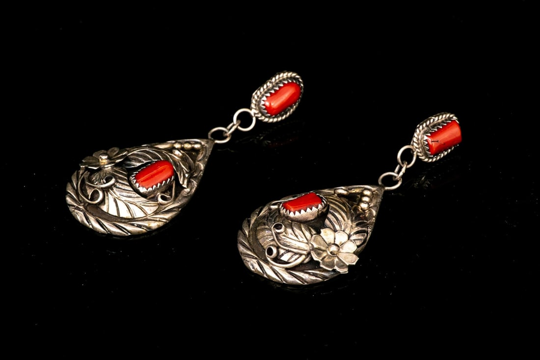 STERLING SILVER EXOTIC CORAL, FLOWER AND FOLIATE DROP PENDANT EARRINGS, SIGNED: These beautiful sterling silver earrings are a drop pendant style, featuring red coral tops, with a rope edge, from which a large pear shaped pendant is suspended, decorated with red coral, and an int