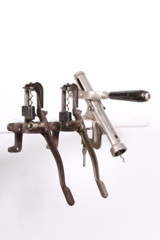 BAR CORKSCREWS, LOT OF THREE: Two wall mount and one Rapid counter mount