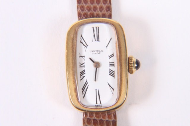 UNIVERSAL GENEVE 18K GOLD LADIES WRIST WATCH: 6 1/4" long with band working condition unknown