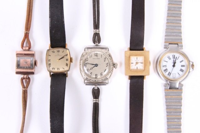 GROUP OF FIVE LADIES WATCHES: Including: 14K gold Waltham, vintage gold plated Movado, Vintage gold plated Sarcar, Dunhill Millenium steel and gold plated and a deco square face gold plated watch. Note: Small wrist size: 6" long w