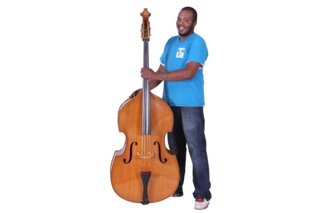 GOOD VINTAGE ROMANIAN DOUBLE BASS: Cherry neck with applied brass hardware, split in neck that has been restored, finish is scratched and crazed in some areas, sound is good, 72" high along with a TKL padded soft case.