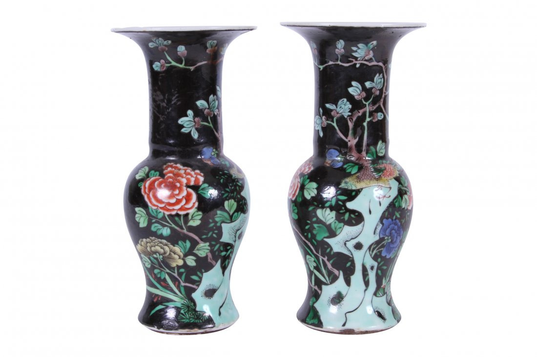 Pair Of Chinese Late Qing Dynasty Famille Noir Cabinet: Pair Of Chinese Late Qing Dynasty Famille Noir Cabinet Vases decorated with colorful exotic birds in flowering rockeries