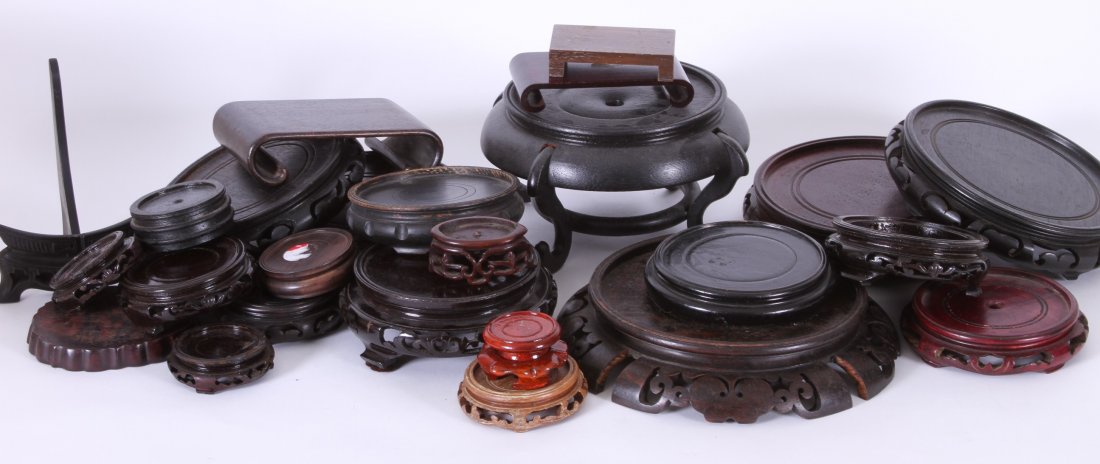 Group Of 25 Chinese Stands And Bases: Group Of 25 Chinese Stands And Bases Vintage and antique carved wood stands ranging in size from 2" to 9 1/2" diameter