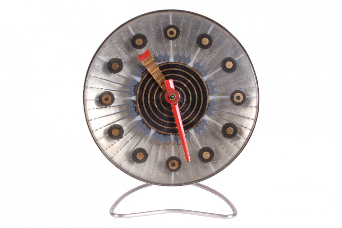 Higgins Art-Glass Vintage Mid-Century Modern Clock: General Electric clock model 5H70 made in Ashland MA USA circa 1954. Face measures 8" diameter overall is 9" high. Good working condition.
