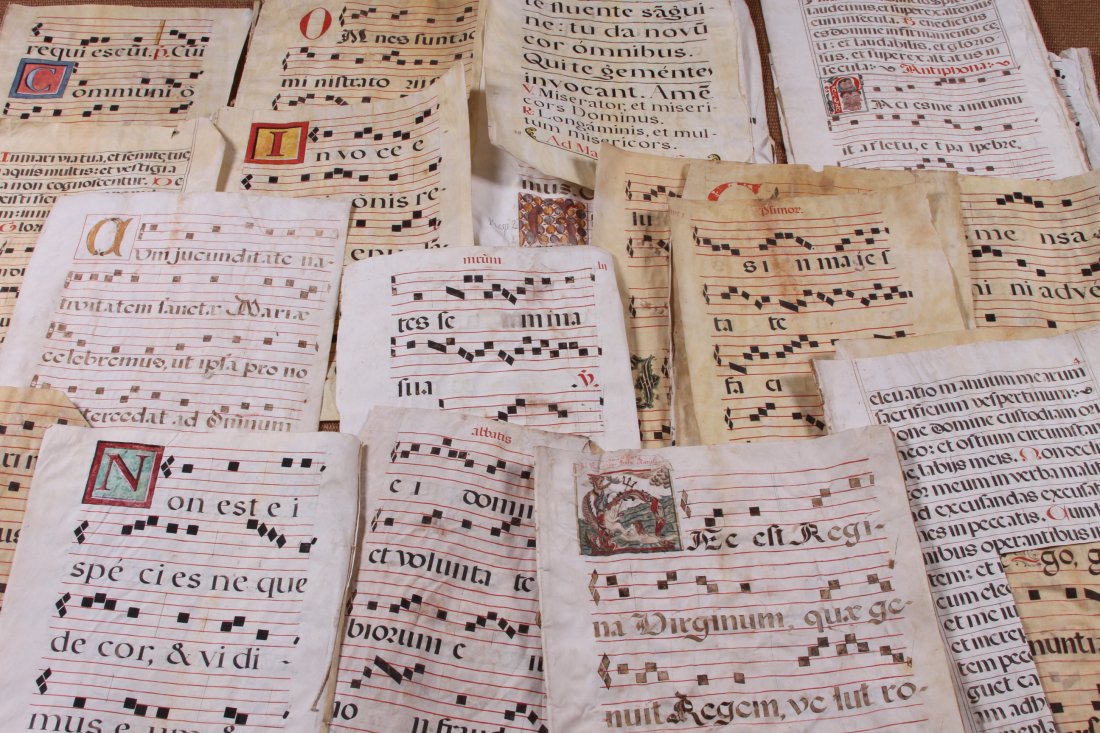 Collection Of 40 - 17th Century Music Manuscripts On: Over 40 sheets of hand written Gregorian Chant many with colored initials in upper corner. Some pages still bound together. Approximate measurement 19 3/4" x 27 3/4." Many have tears and som