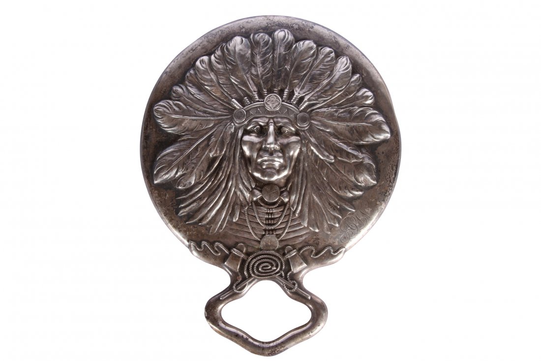 Unger Brothers Sterling Silver Hand Mirror With Native: Dimensions: 6 1/2 x 5 inches. Condition: Some dents along edge around mirror and two on the handle.