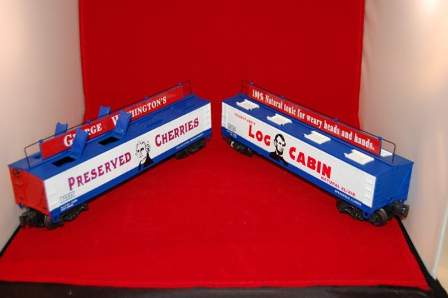 K Line 178997 and 186165 Vat Car: Red white and blue with faces of Lincoln and Washington