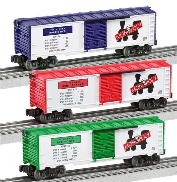 Set of 3 Lionel Monopoly Boxcars: Three boxcars in boxes. Set includes 39311 Baltic Avenue, 39312 Kentucky Avenue, 39313 Pacific Avenue. The images are stock since the items are sealed in the box.
