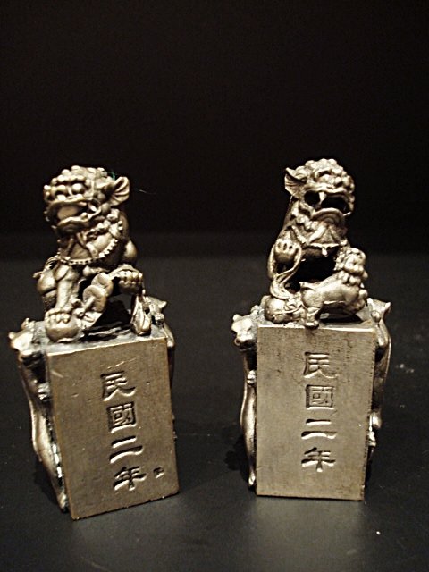 Antique Chinese pair silver seal: Antique Chinese pair silver seal with foo dogs, beasts and calligraphy, 2.35in high.