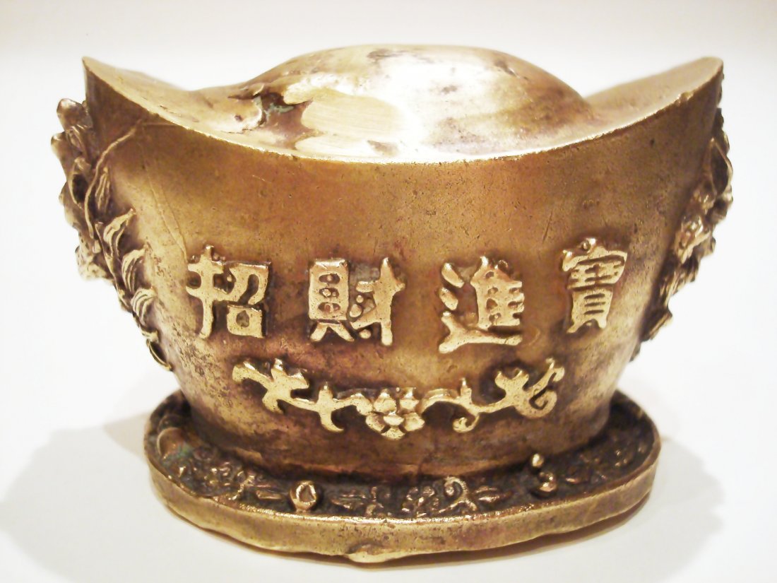 Chinese Ming Gold ingot dragons: Chinese Ming Gold ingot dragons, carved with figures and calligraphy, mark on the base. 3.50in wide. 343gr.