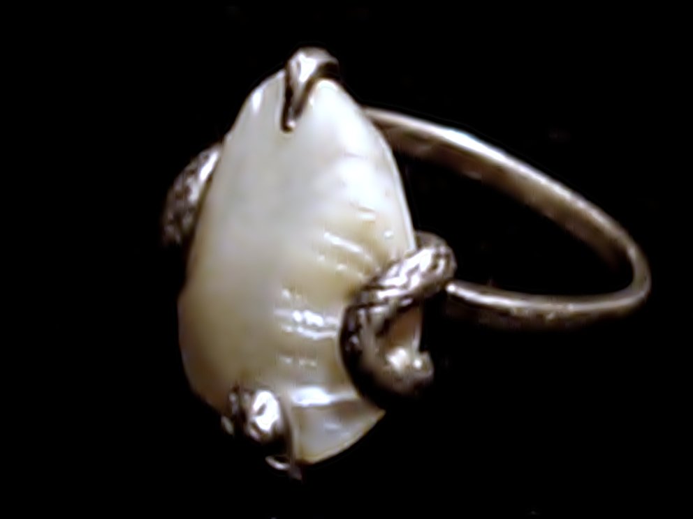 C1850 Antique Chinese Ring Silver Snake & Natural Pearl: C1850. Antique Chinese ring silver snake shaped by threading a fine and baroque natural pearl of 16 mm x 11 mm. Weight: 2.9 g.