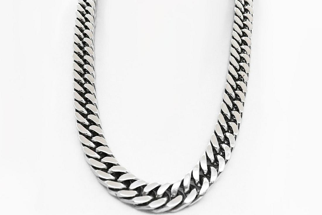 Man's Stainless Steel Cuban Chain Necklace: Quality: 1 Item: Cuban Chain Necklace Weight: 291 grams Width: 15 mm Length: 25 inches Thickness: 5.5 mm Color: Silver Design: Cuban Chain Link Lock: Lobster Lock Metal: Stainless Ste