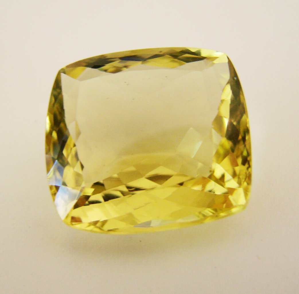 Loose Natural Lemon Topaz Cushion Shape 33.24CT: Gem Type: Natural Lemon Topaz Qty: 1 Weight: 33.24 Carat Size: 120x20.11x11mm Shape: Cushion cut Cut: Facet Cut Clarity: VS Color: Light Yellow Origin: Brazil Item will come with Apprai