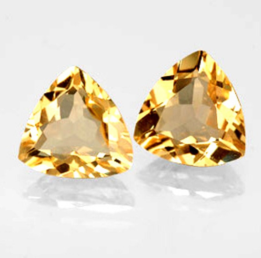 2Loose Natural Yellow Beryl Trillion Cut 3.41 CT: Gem Type: Natural Yellow Beryl Qty: 2 Weight:3.41 Carat 3>Size: 8x8x5.9MM Shape: Trillion Cut: Facet cut Clarity: VS Color: Yellow Origin: Brazil Treatment; Untreated