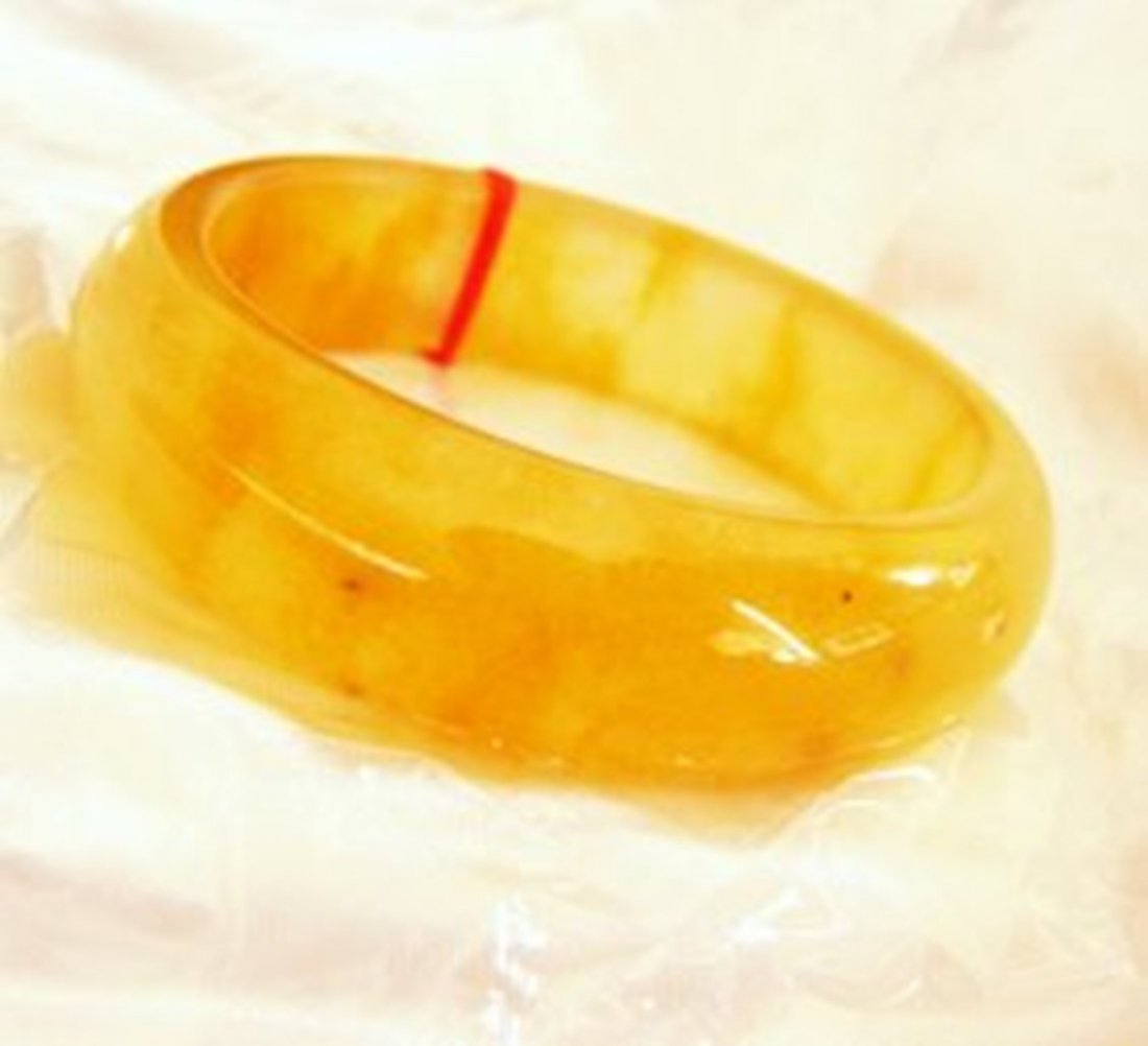Natural Jadeite Jade Bangle JBA-2B/Size 6.5: Natural Jadeite Jade Bangle Clarity: JBA-2B,Two Color: Golden-Silver Transparency: Semi -Transparent Shape & Cut: Solid Jade Band Haft Round Jade Finish: High Polish Remarks: Genuine Jadeite Quality: 