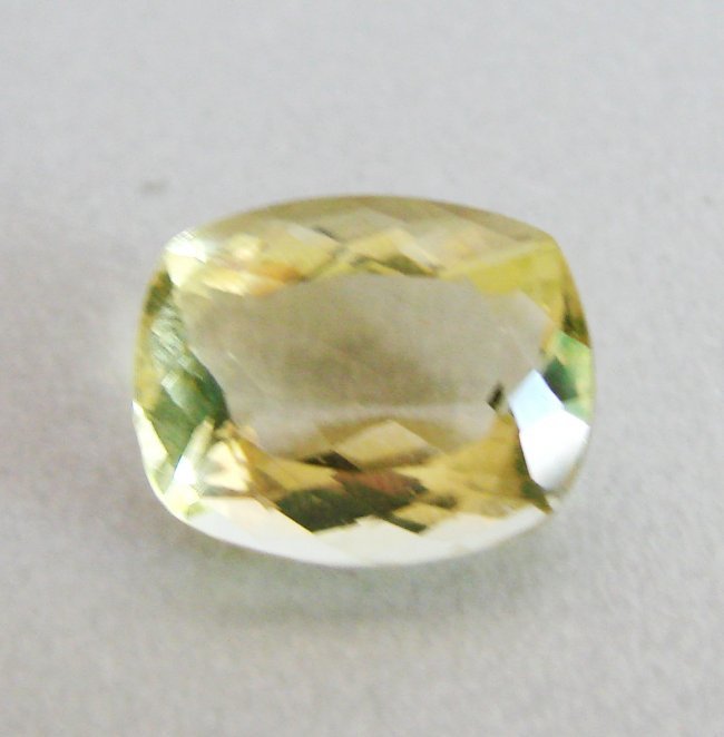 Natural Lemon Topaz Octagon Shape 8.35Ct: Gem Type: Natural Lemon Topaz Qty: 1 Weight: 8.35 Carat Measurement: 14x11.8x7.5 mm Shape: Octagon Cut: Facet Cut Clarity: VS Color: Light Yellow Origin: Brazil