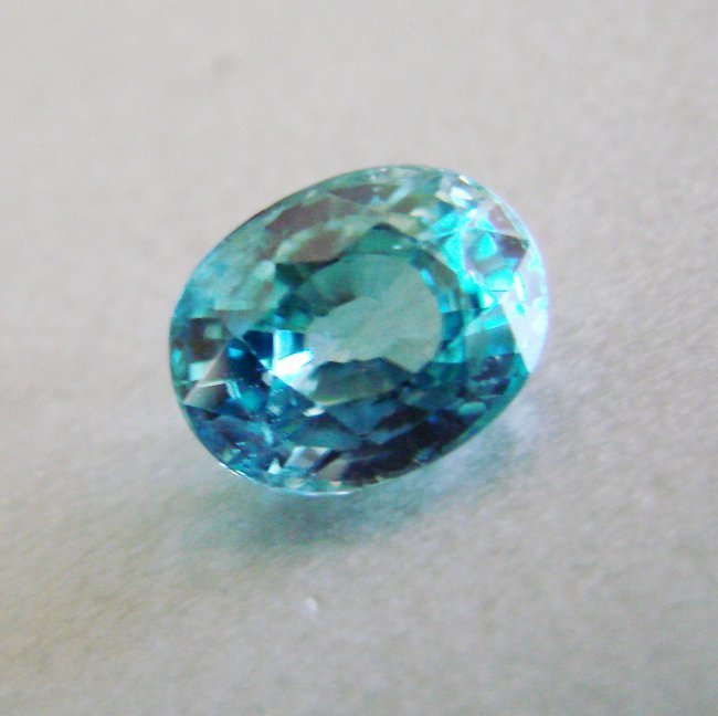 Natural Blue Zircon Oval Cut 4.85Ct 10x7.7x5.8 mm: Gem: Natural Blue Zircon Measurement: 10 x 7.7 x 5.8 mm Weight: 4.85 Carat Shape: Oval Facet Clarity: VVS, Color: Blue Treatment: Heated Origin: Cambodia Estimate Value Prices $1,750 Item will c