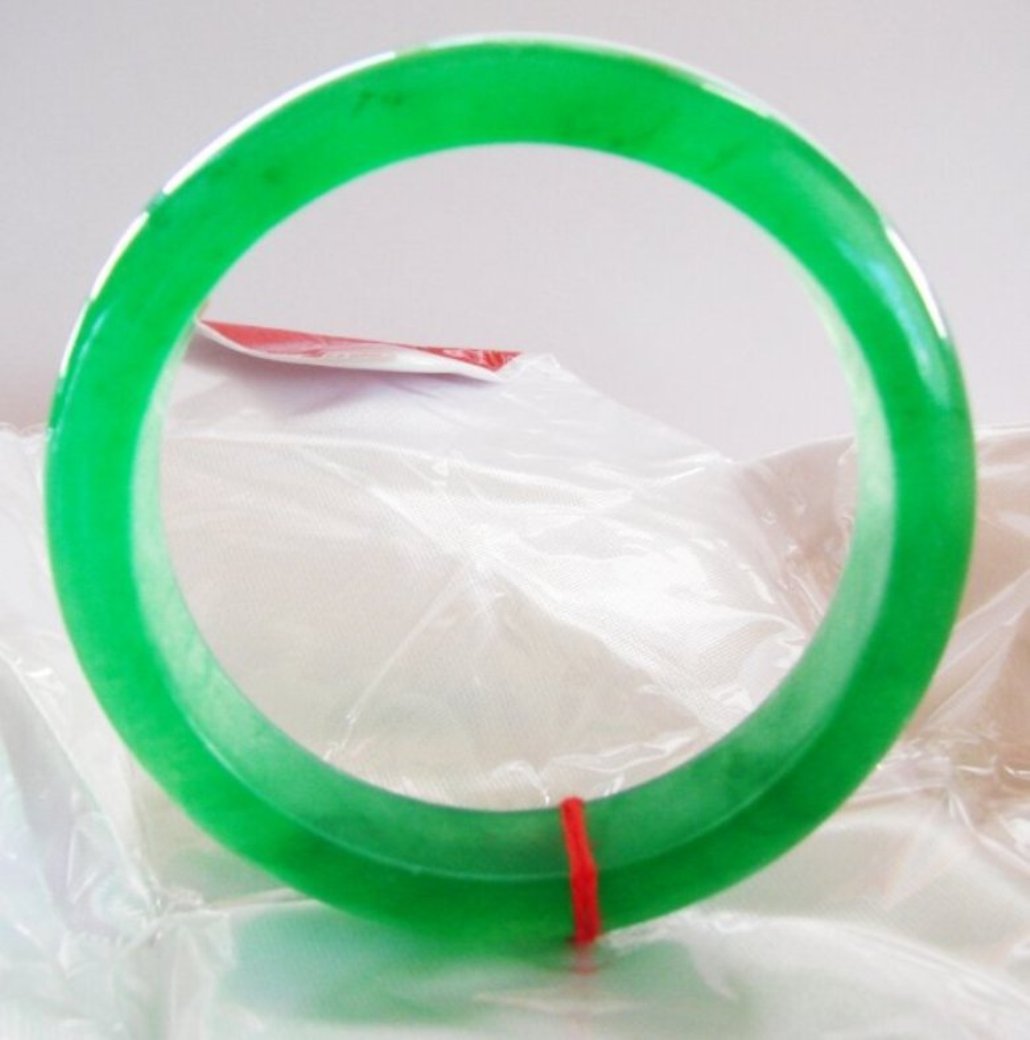 Natural Jadeite Jade Bangle Grade: B / Size 8: Natural Jadeite Jade Bangle Qty: 1 Grade: A Color: Dark Green Transparency: Semi -Transparent Shape & Cut: Solid Jade Band Haft Round Jade Finish: High Polish Remarks: Genuine Jadeite Jade Quali