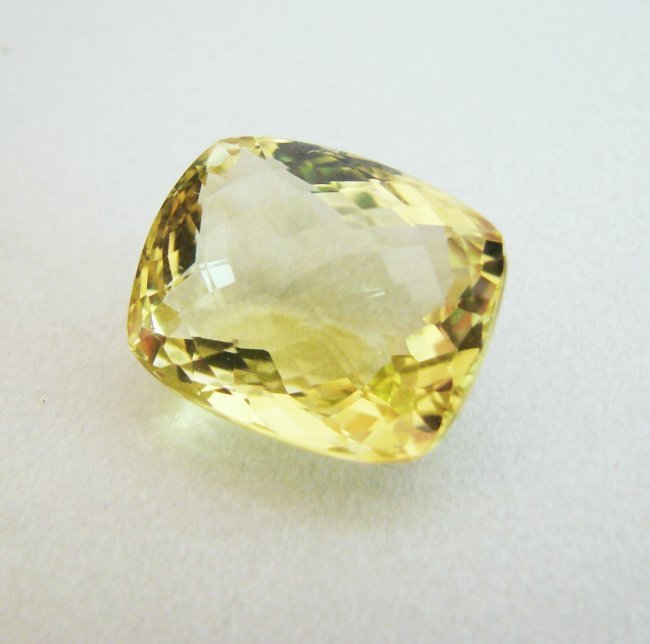 Natural Lemon Topaz Octagon Shape 17.72Ct: Gem Type: Natural Lemon Topaz Qty: 1 Weight: 17.72 Carat Measurement: 18x15.2x9.6 mm Shape: Octagon Cut: Facet Cut Clarity: VS Color: Light Yellow Origin: Brazil