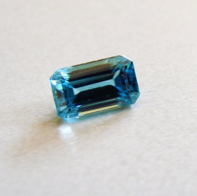 Natural Blue Zircon Octagon Cut 3.06Ct 9.2x5.5x4.5 mm: Gem: Natural Blue Zircon Measurement: 9.2x5.5x4.5 mm Weight: 3.06 Carat Shape: Octagon Facet Clarity: VVS, Color: Blue Treatment: Heated Origin: Cambodia Estimate Value Prices $1,080 Item will c
