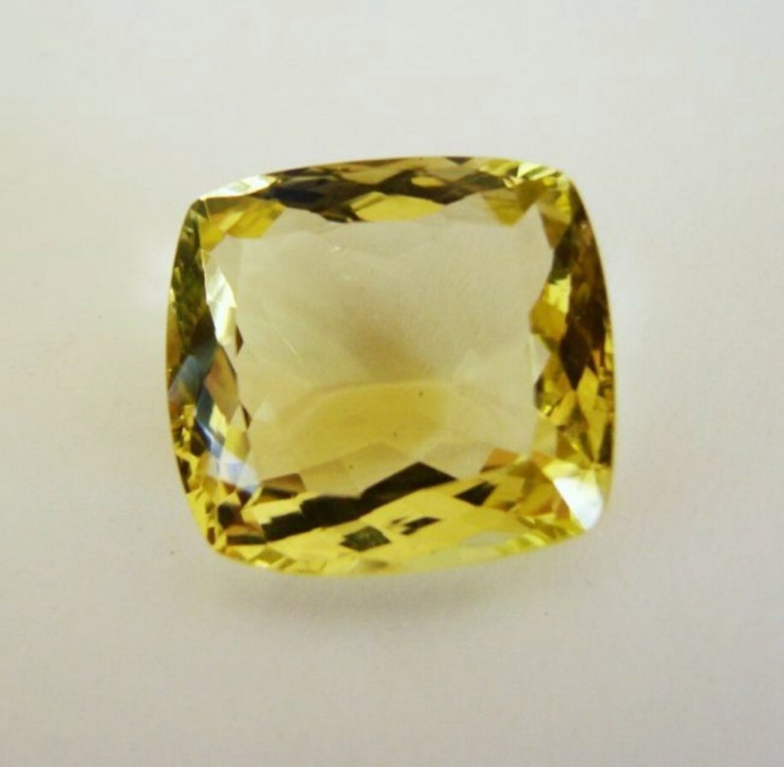 Loose Natural Lemon Topaz Cushion Shape 30.80Ct: Gem Type: Natural Lemon Topaz Weight: 30.80 Carat Measurement: 19.2x17.5x13.5mm Shape: Cushion cut Cut: Facet Cut Clarity: VS Color: Light Yellow Origin: Brazil Estimate Value Price $2,750
