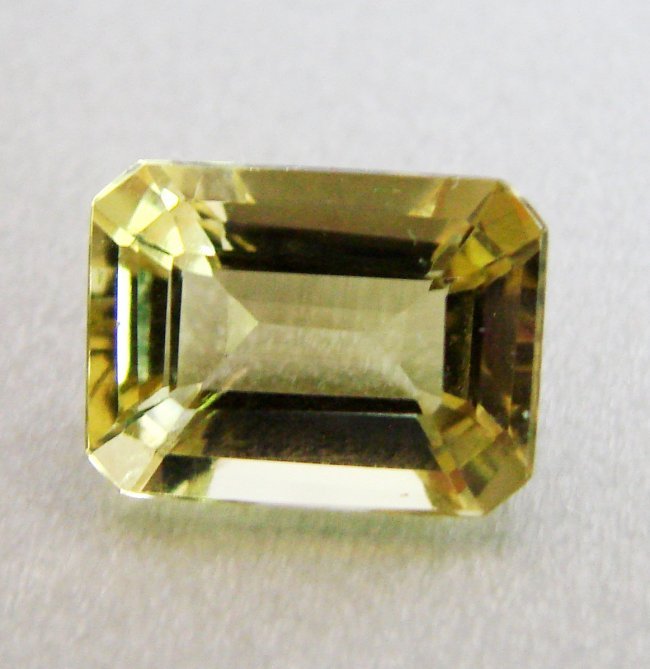 Natural Lemon Topaz Octagon Shape 5.82Ct 13x9.7x6.5mm: Gem Type: Natural Lemon Topaz Qty: 1 Weight: 5.82 Carat Measurement: 13x9.7x6.5 mm Shape: Octagon Cut: Facet Cut Clarity: VS Color: Light Yellow Origin: Brazil