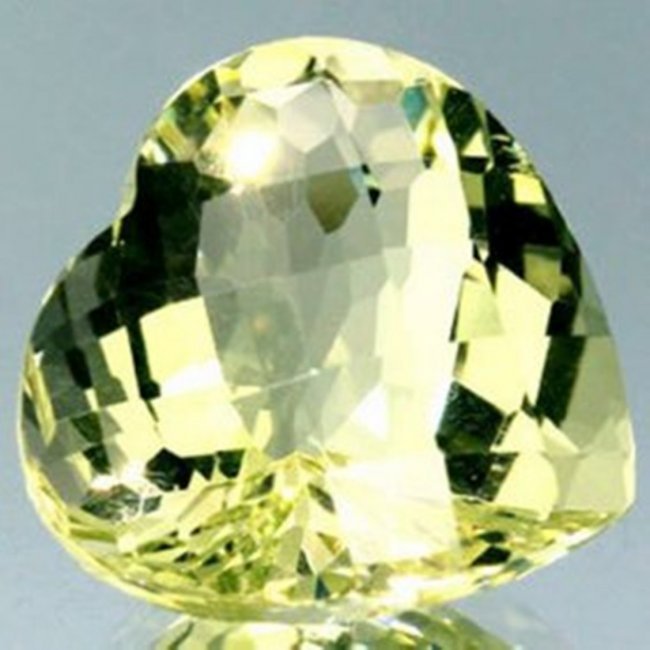 Loose Natural Lemon Topaz Heart Shape 6.63Ct: Gem Type: Natural Lemon Topaz Qty: 1 Weight: 6.63 Carat Measurement: 13x12.7x8.5 mm Shape: Heart Checkerboard Clarity: VS Color: Yellow Origin: Brazil Estimate Value Price $270