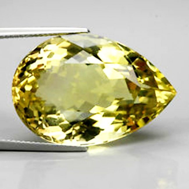Loose Natural Lemon Topaz Pear Shape 6.43Ct: Gem Type: Natural Lemon Topaz Weight: 6.43 Carat Measurement: 16x10.6x7.3 mm Shape: Pear Cut: Facet Cut Clarity: VS Color: Light Yellow Origin: Brazil