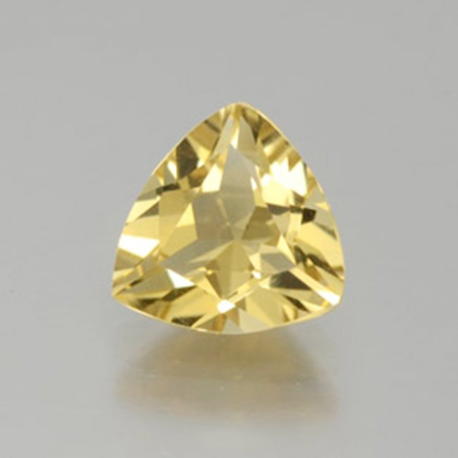 Natural Yellow Glden Beryl Trillion Cut 1.18Ct: Gem Type: Natural Yellow Golden Beryl Weight:1.18 Carat Measurement: 7.9x7.8x4.2 mm Shape: Trillion Facet Clarity: VS,Color: Yellow Golden Origin: Madagascar Treatment: None