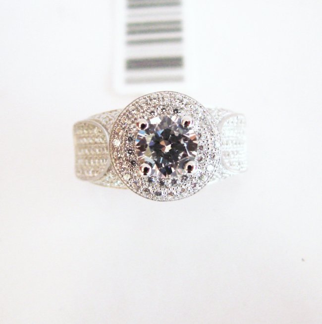 Creation Diamonds Ring 4.21Ct 18k W/g Overlay: This item was made by high quality handicrafts Gem Type: Creation Diamonds High Quality Item Total Weight: 4.21carat Center .97 Carat Round Brilliant Clarity: VVS-Color: D Band Setting Creation White 