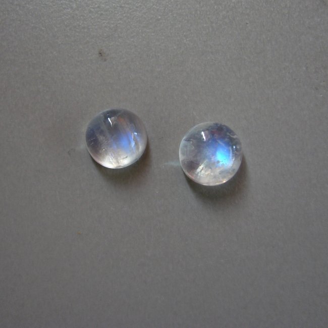 Pairs White Rainbow Moonstone Round 3.42Ct 7.9x3.8mm: Gem: Natural Moonstone Qty: Pairs Weight: 3.42 Carat Round Shape Cut: Cabochon Measurement: 7.9x3.8mm Clarity: Transparent Color: Blue White Rainbow Treatment: None Origin: Sri Lanka (Ceylon)