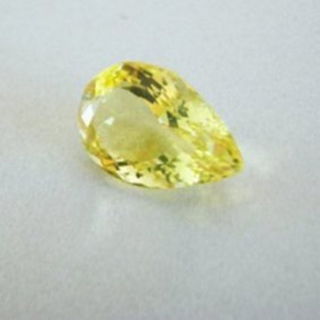 Loose Natural Lemon Topaz Pear Shape 9.82Ct: Gem Type: Natural Lemon Topaz Weight: 9.82 Carat Measurement: 18.4x12x8.2 mm Shape: Pear Cut: Facet Cut Clarity: VS Color: Light Yellow Origin: Brazil