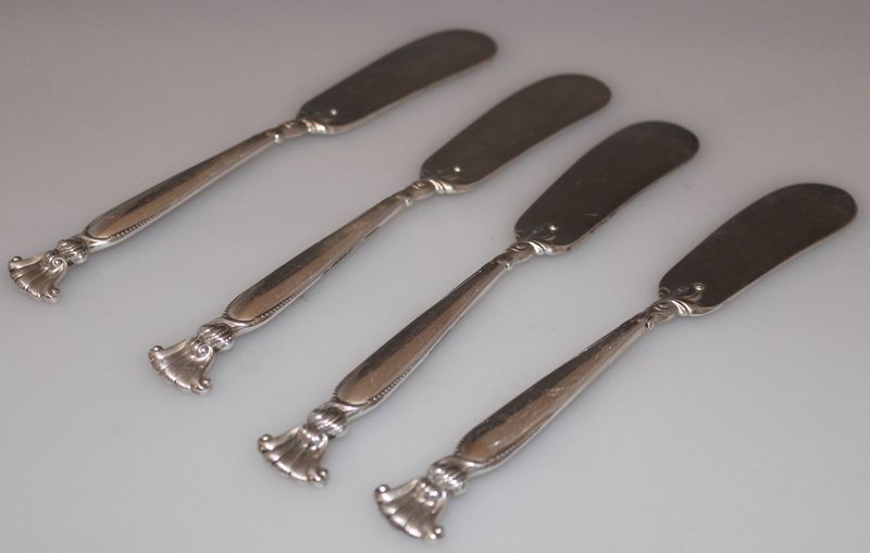 WALLACE ROMANCE OF THE SEA 4 STERLING BUTTER KNIFES: We present for your consideration this collection of 4 solid sterling silver Butter Knifes, classic vintage Pattern Romance of the Sea by Wallace Silversmiths, designed by William S Warren , Solid ste
