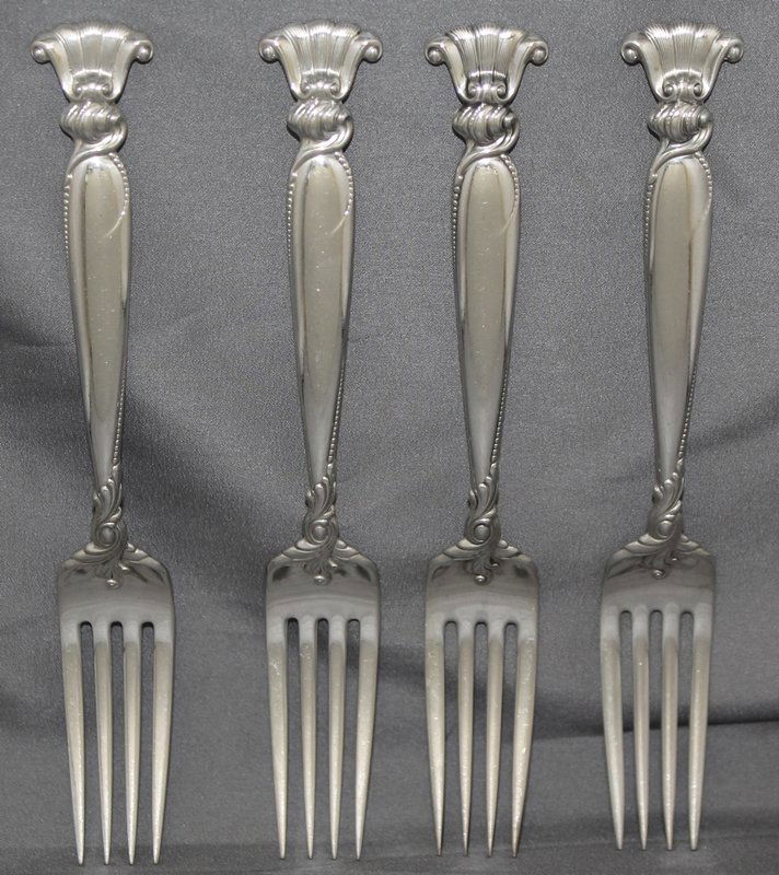 WALLACE ROMANCE OF THE SEA 4 STERLING PLACE FORKS: We present for your consideration this collection of 4 sterling silver Place Forks , classic vintage Pattern Romance of the Sea by Wallace Silversmiths, designed by William S Warren , Solid sterling.